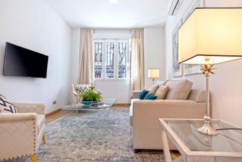 Foto de una habitación de Apartamentos Genteel Home Recaredo