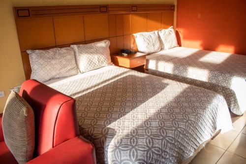 Room – Grand Caporal Hotel