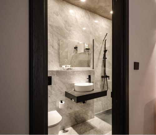 Foto de una habitación de Casa Reale Boutique Hotel