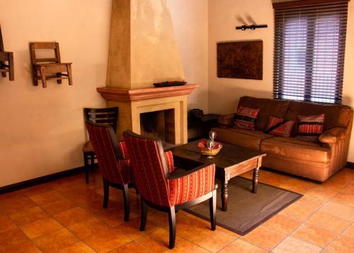 Foto de una habitación de Hotel All Suite El Marques de Antigua