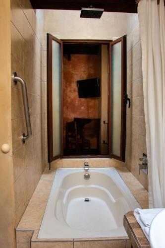 Foto de una habitación de Hotel All Suite El Marques de Antigua