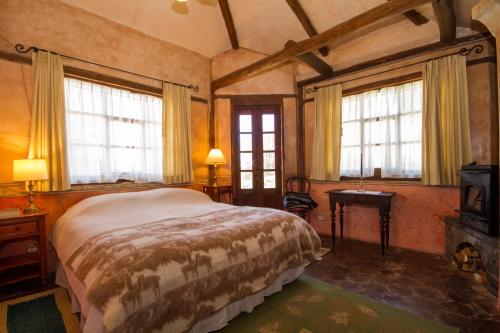 Foto de una habitación de Hotel Hacienda San Agustin de Callo
