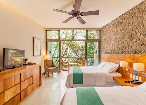 Foto de una habitación de Kawilal Hotel