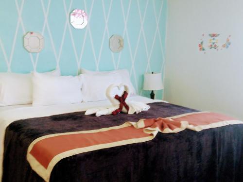 Foto di una camera da Hotel The Red Hut Inn