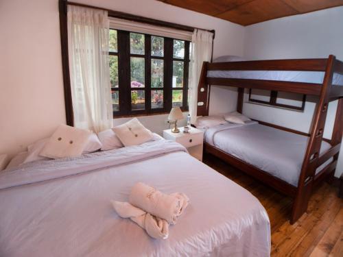 Foto de una habitación de Hosteria Papagayo Cotopaxi