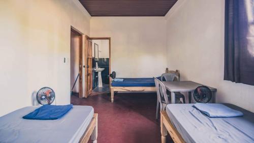 Foto de una habitación de Badaboom Hostal &amp;amp; Surf