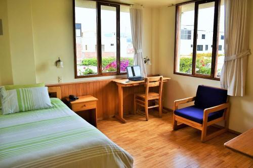 Foto de una habitación de Hotel Rincon Aleman