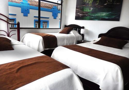 Foto de una habitación de La Merced Plaza Hostal