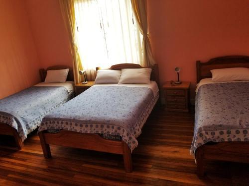 Foto de una habitación de Albergue Travellers Inn