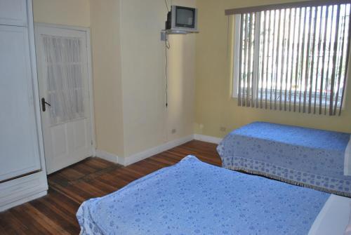 Foto de una habitación de Albergue Travellers Inn