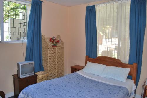 Foto de una habitación de Albergue Travellers Inn
