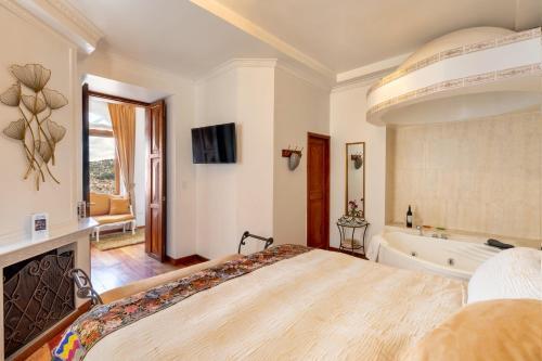 Foto de una habitación de Vista del Angel Hotel Boutique