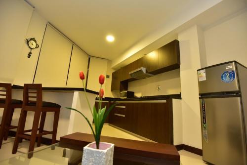 Foto de una habitación de Mai Suites Apart Hotel
