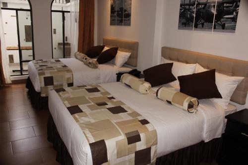 Foto de una habitación de Air Suites Hotel Boutique
