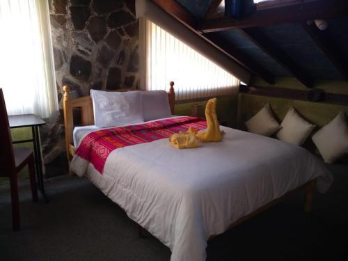 Foto de una habitación de Hotel Boutique Villa de Sant