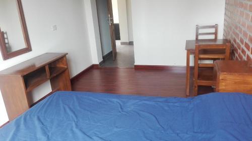Foto de una habitación de Piedra Blanca Backpackers Hostel