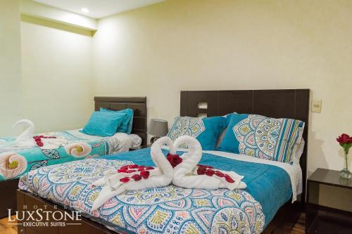 Foto de una habitación de Hotel Luxstone Executive &amp;amp; Suites
