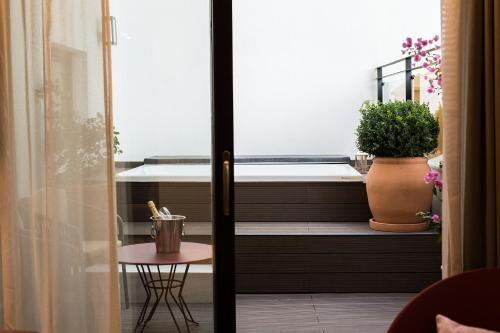 Foto de una habitación de Suites Murillo Plaza Sta. Cruz