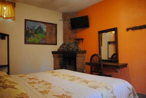 Foto de una habitación de Hotel Real de la Montaña