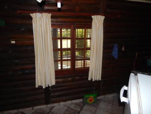 Foto de una habitación de Cabañas Los Troncos