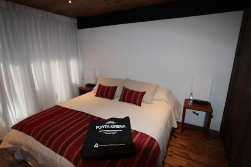 Foto de una habitación de Hotel Punta Sirena