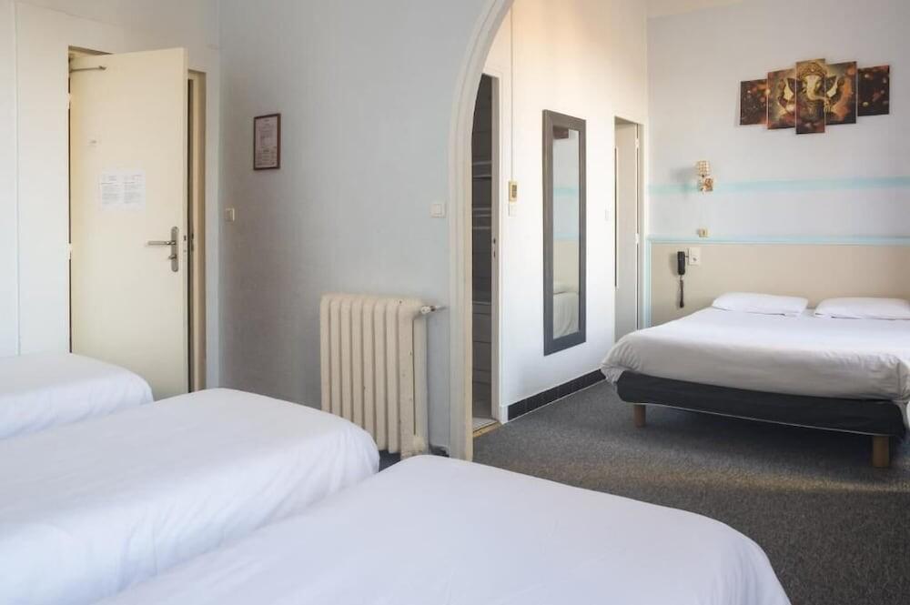 Foto de una habitación de Citotel Hôtel Cesar