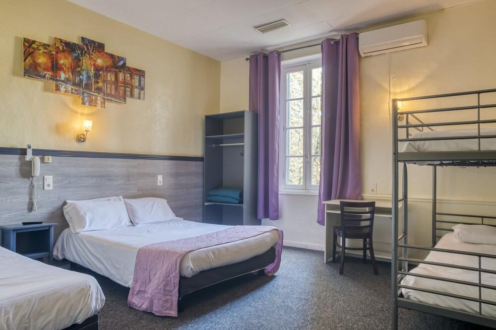 Foto de una habitación de Citotel Hôtel Cesar