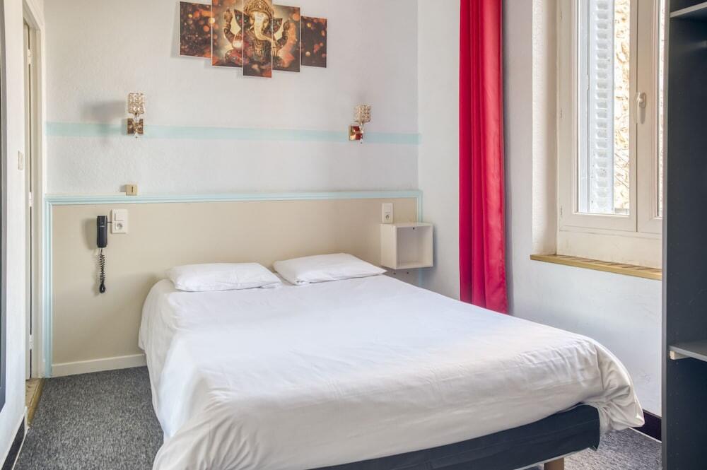 Foto de una habitación de Citotel Hôtel Cesar