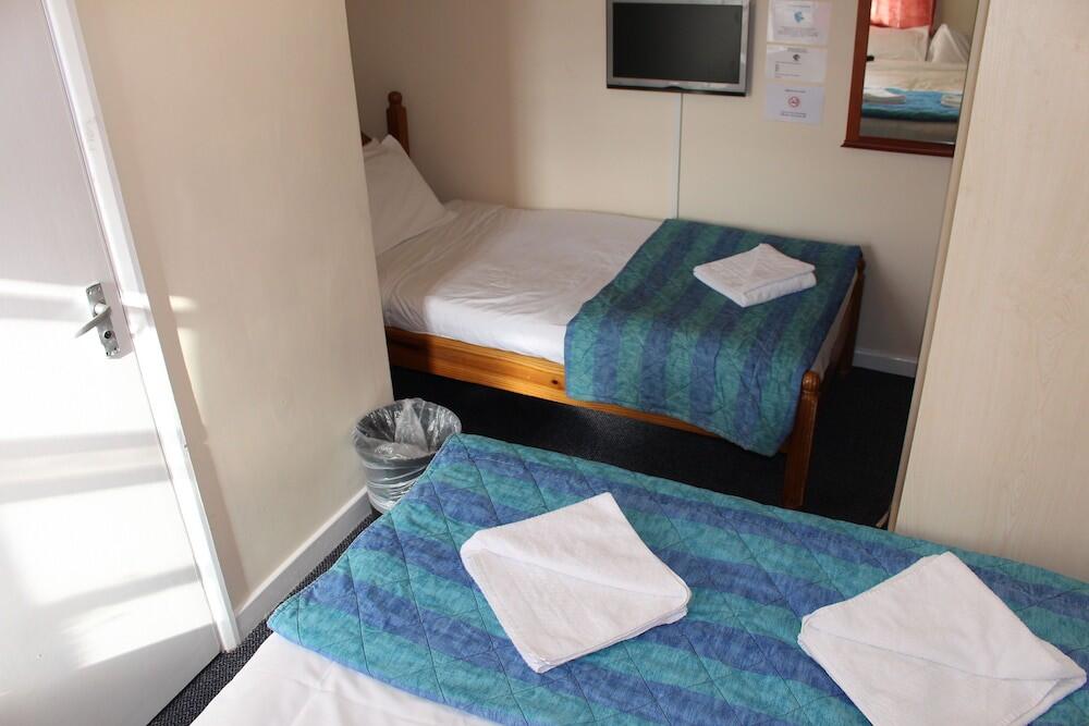 Foto de una habitación de Belgrave House Hotel