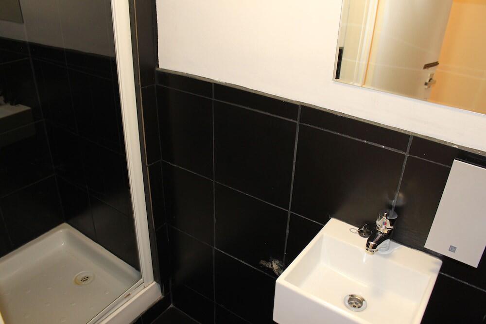 Foto del baño de Belgrave House Hotel
