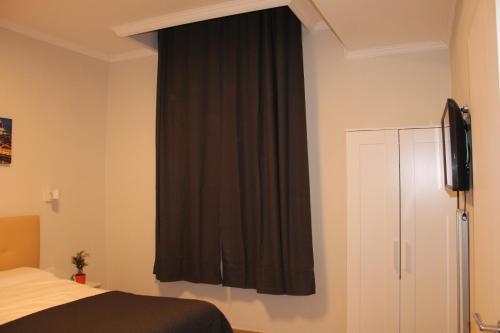 Foto de una habitación de Hotel 900 Toscana Florence