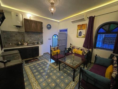 Foto de una habitación de Hotel Dar Nokhba Inn
