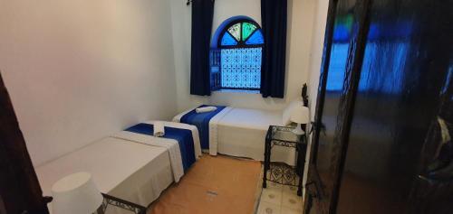 Foto de una habitación de Hotel Dar Nokhba Inn