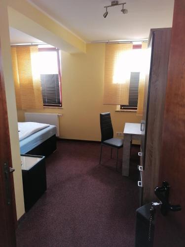 Foto de una habitación de Pension Riverside in Leverkusen Hitdorf am Rhein - Zentral an der A1 und 59