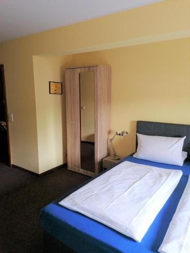 Foto de una habitación de Pension Riverside in Leverkusen Hitdorf am Rhein - Zentral an der A1 und 59