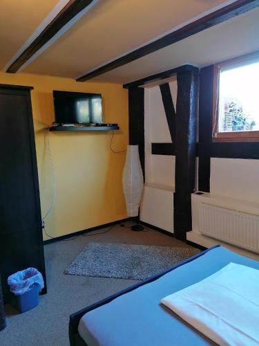 Foto de una habitación de Pension Riverside in Leverkusen Hitdorf am Rhein - Zentral an der A1 und 59