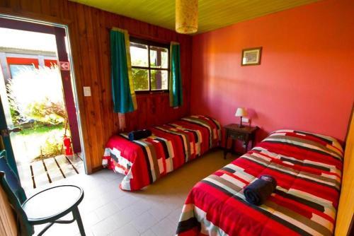 Foto de una habitación de Lago Argentino Hostel