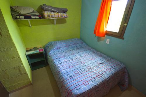 Foto de una habitación de Lago Argentino Hostel