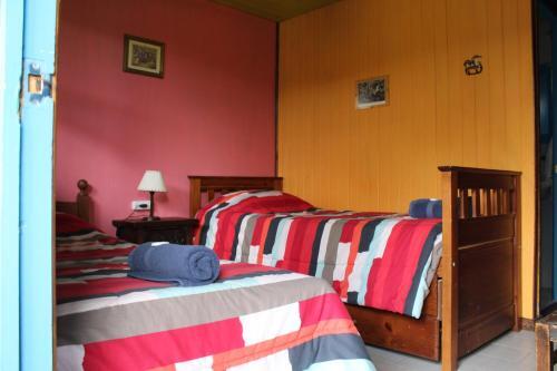 Foto de una habitación de Lago Argentino Hostel