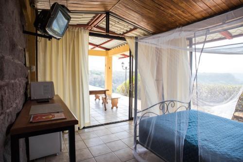 Foto de una habitación de Las Cabañas Encantadas de Nindirí