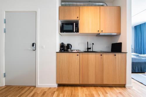 Foto de una habitación de By the Lakes apartments - Into This Place