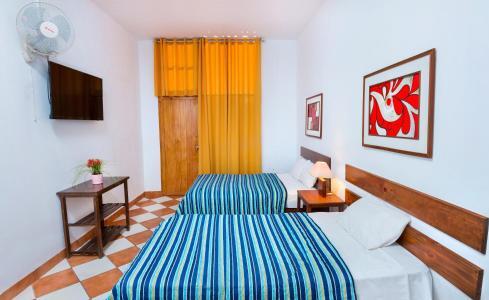 Foto de una habitación de Hotel Cocos Inn
