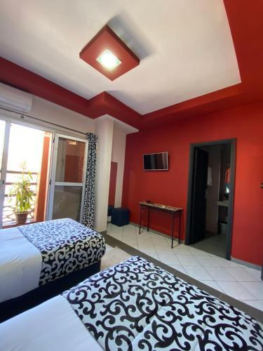Foto de una habitación de Hotel VELSATIS