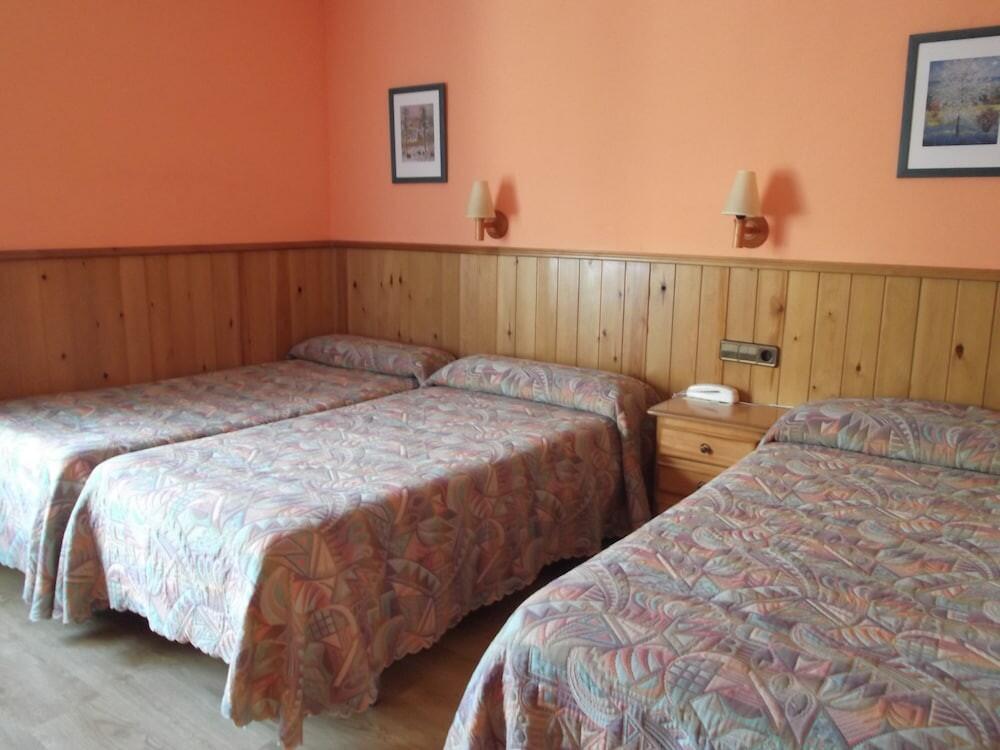 Foto de una habitación de Hotel Escalar