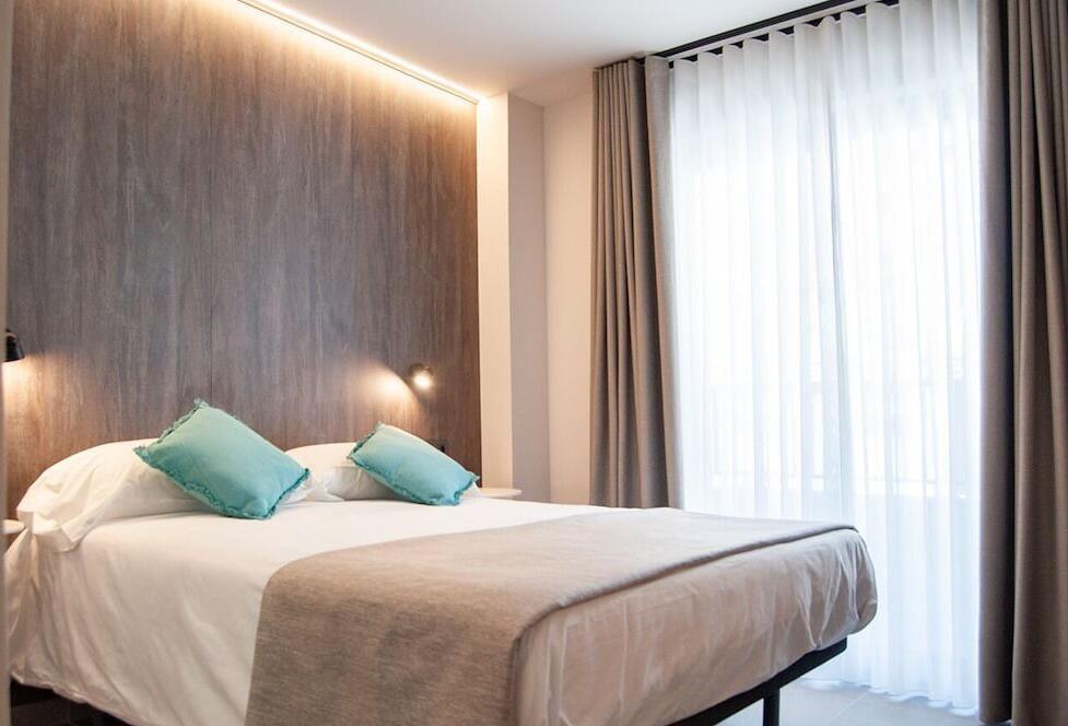 Foto de una habitación de Hostal Quatre Llunes