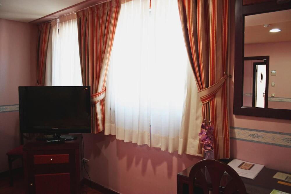 Foto de una habitación de Hosteria Sara by gaiarooms