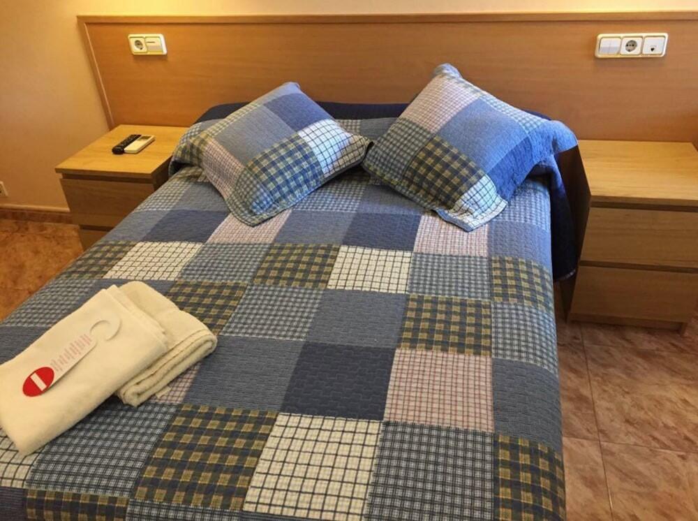 Foto de una habitación de Hostal Rio De Castro