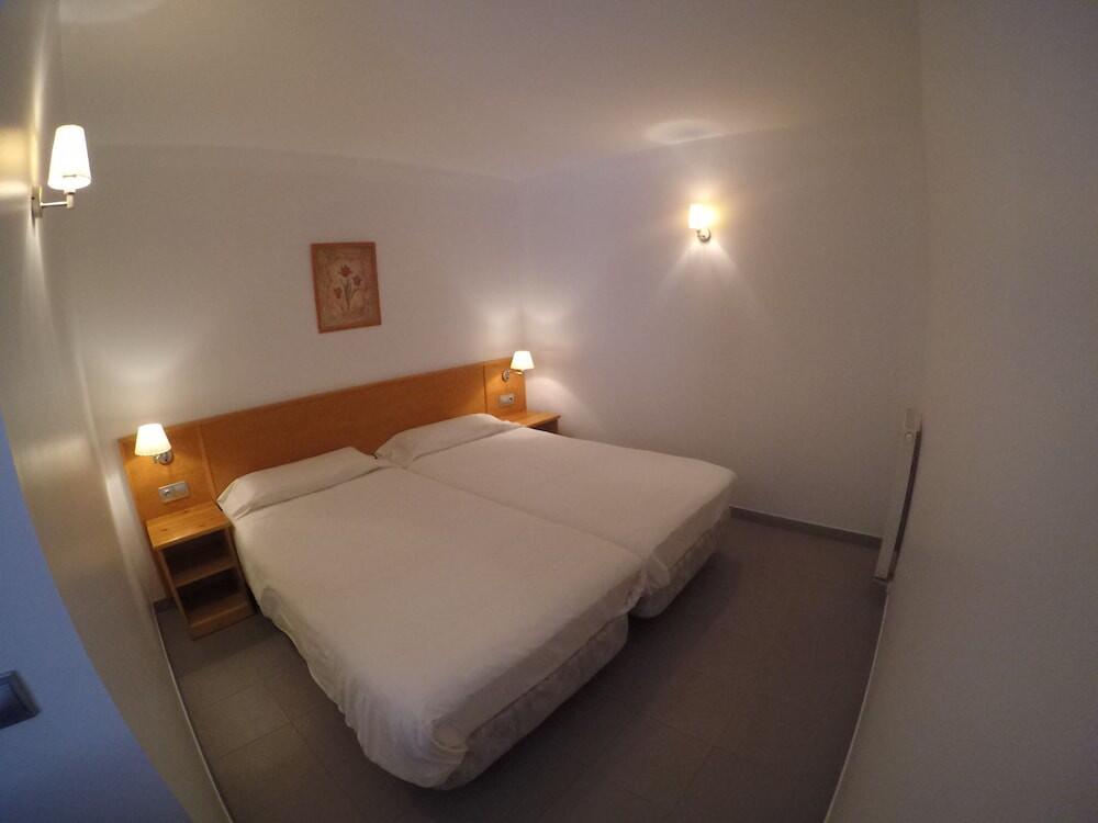 Foto de una habitación de Apartamentos Turísticos Roc Del Castell