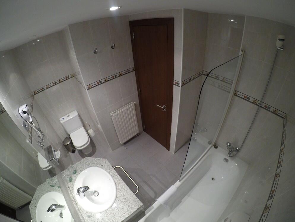 Foto del baño de Apartamentos Turísticos Roc Del Castell