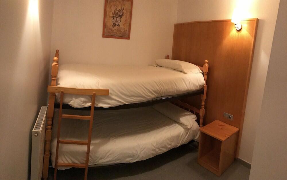 Foto de una habitación de Apartamentos Turísticos Roc Del Castell